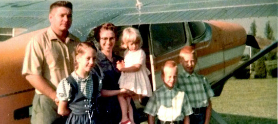 Family with plane in 1968 image