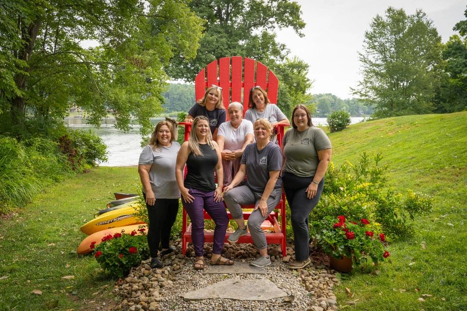 Staff Pic on red chair